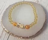 Minimalist Natural Glass Beads with Gold Plated Pi Yao and Mantra