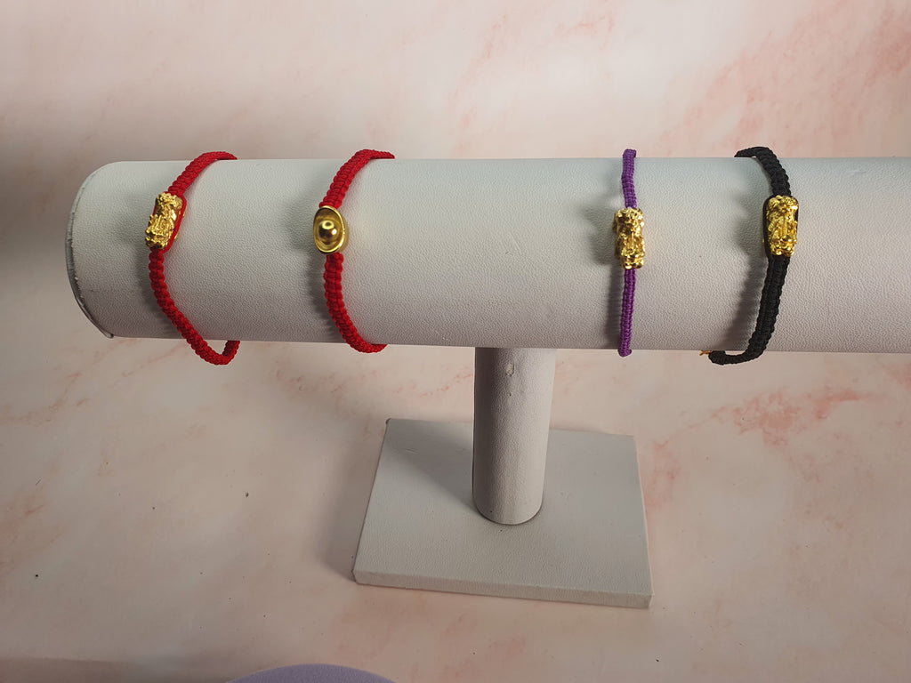 String Bracelet with Gold Plated Lucky Charms and Clasp