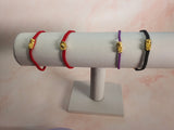 String Bracelet with Gold Plated Lucky Charms and Clasp